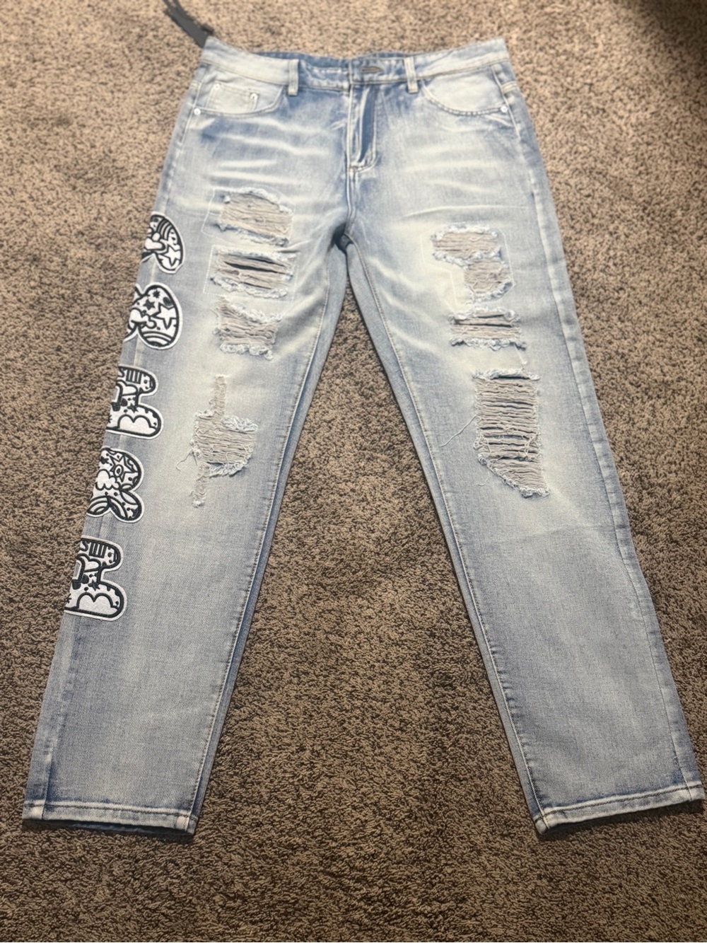 AMIRI Light Blue Distressed Boyfriend Jeans with Side Graphic